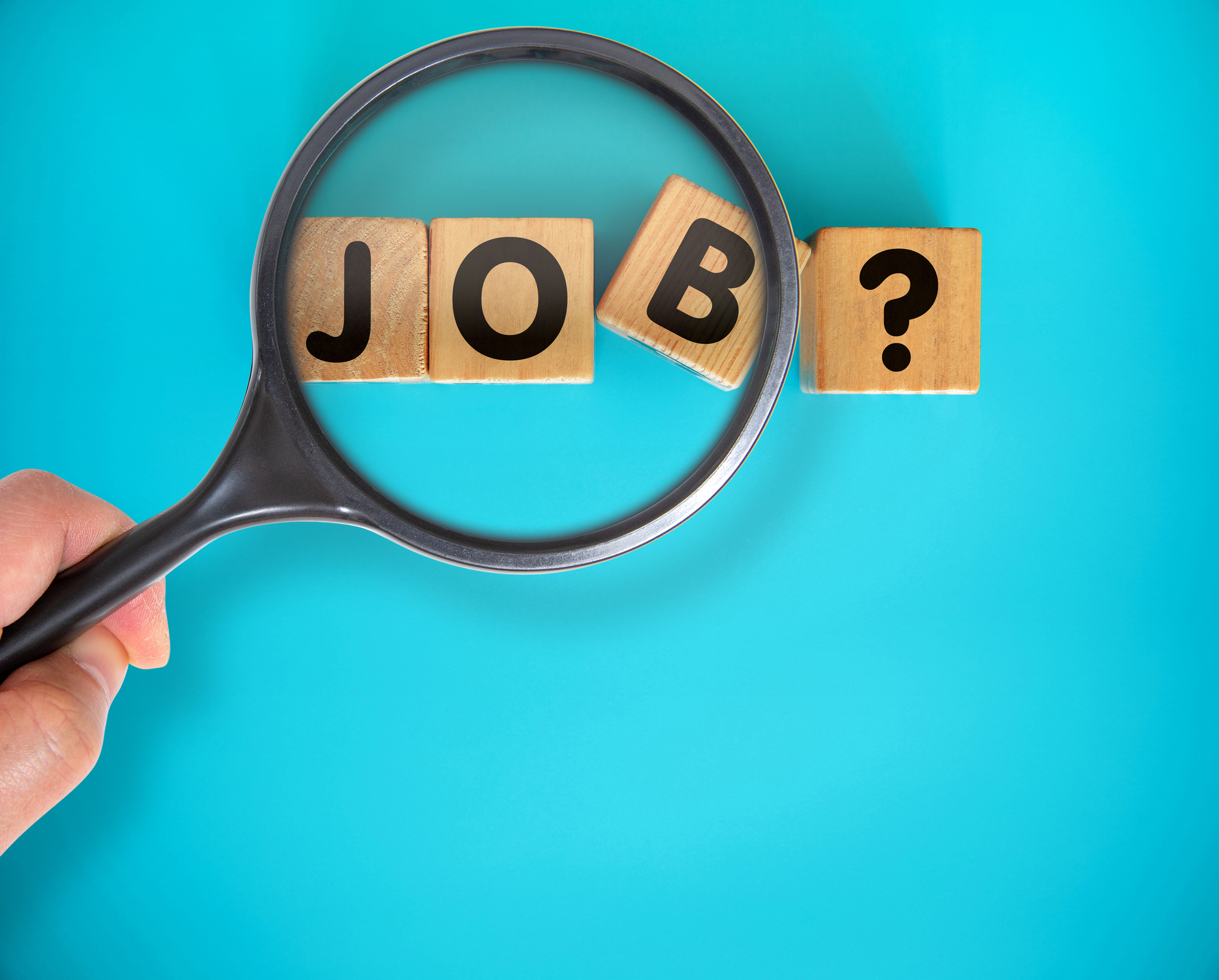 Magnifier glass forming job word on blue background 